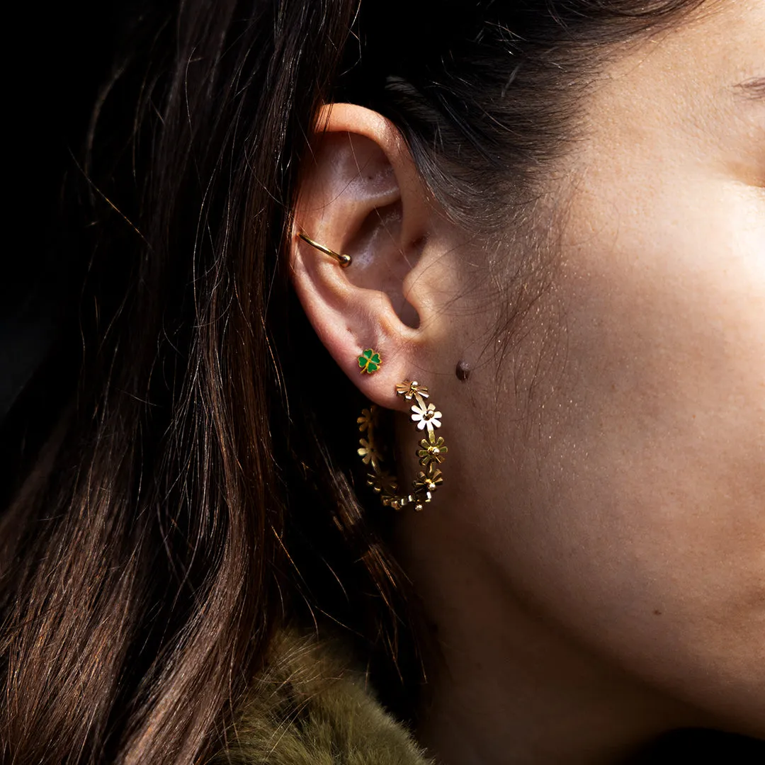 Gold coloured hoop earrings with flowers