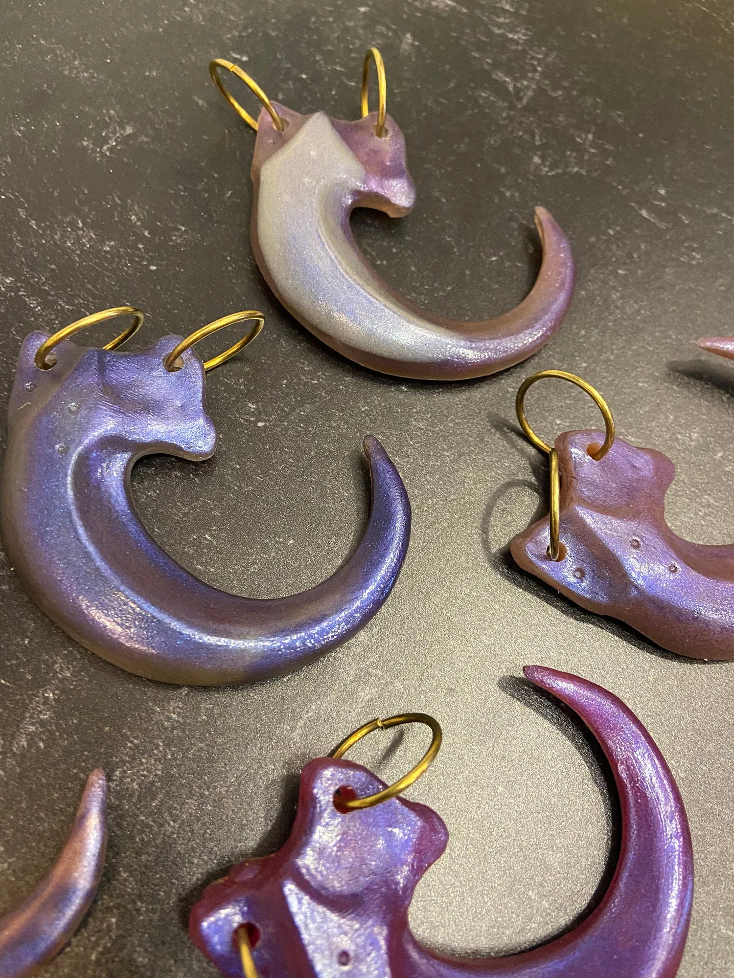 IRIDESCENT PURPLE CLAW PENDANT