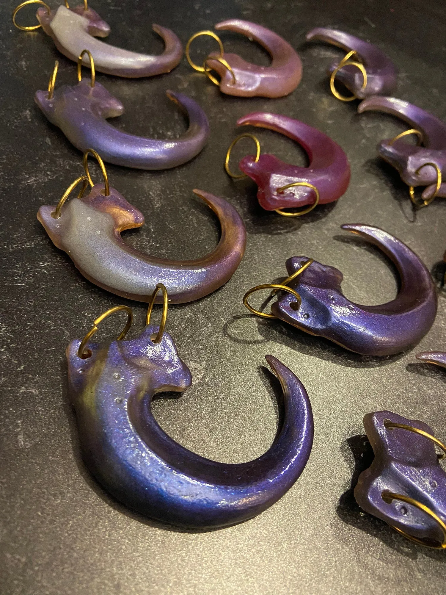 IRIDESCENT PURPLE CLAW PENDANT