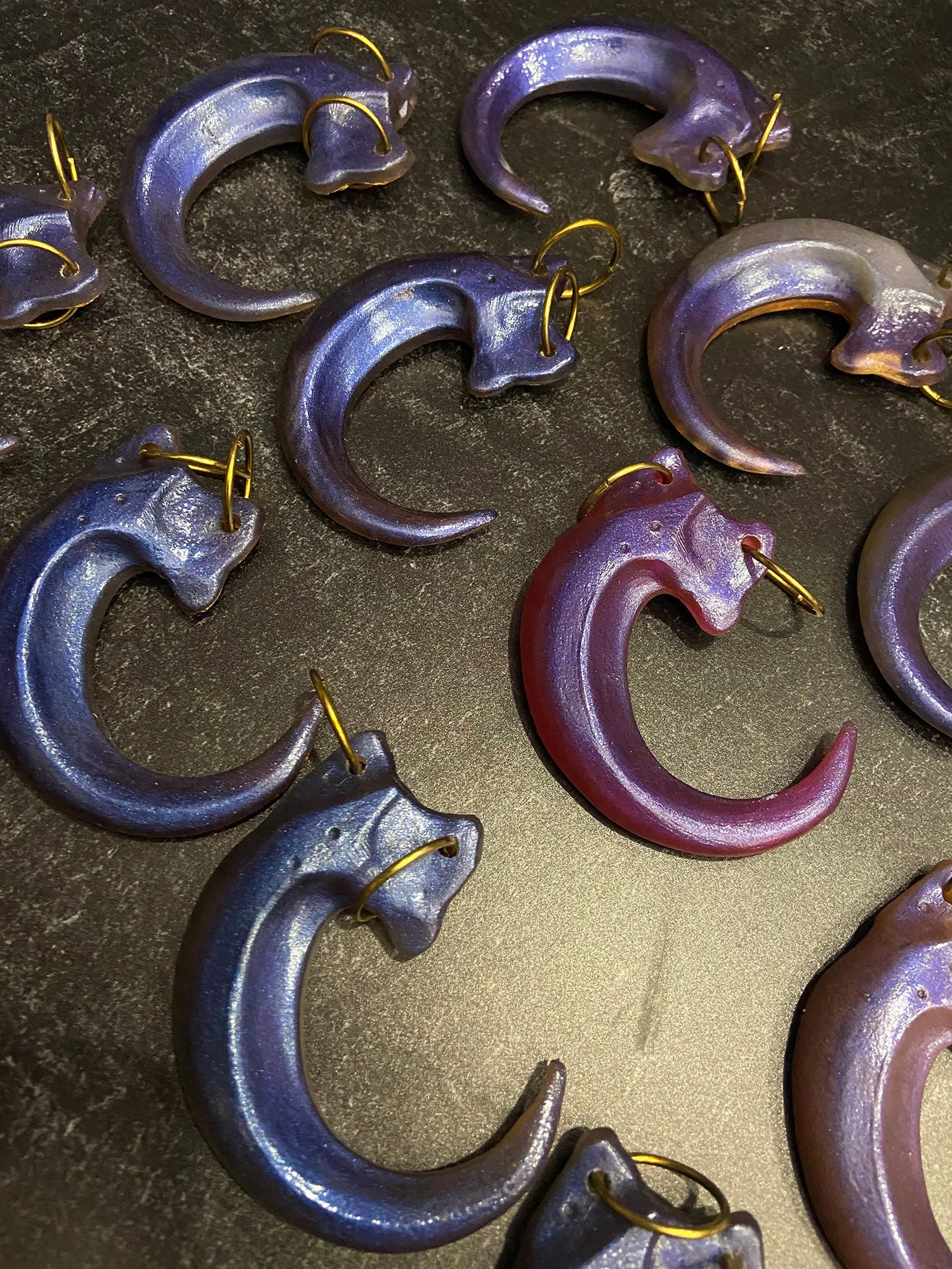 IRIDESCENT PURPLE CLAW PENDANT